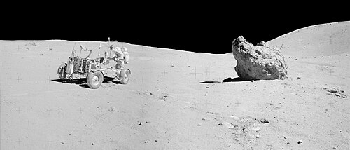 John Young adjusting the LRV's antenna near Shadow Rock