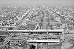 The construction of Harbor Freeway, and its subsequent displacement of homes in Los Angeles, California.[citation needed]