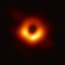 The shadow of the central black hole in the galaxy Messier 87 in Virgo, obtained by the Event Horizon Telescope collaboration. This is the first direct image of a black hole.