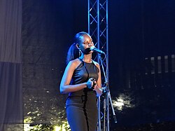 Kenyan spoken-word poet Mumbi Macharia