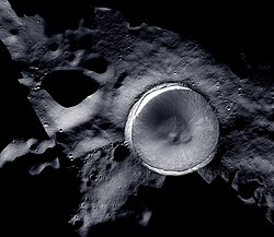 The lunar south pole at the center of this image, situated on the rim of Shackleton Crater. Mosaic image created by LROC (Lunar Reconnaissance Orbiter) and ShadowCam