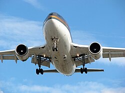 Landing lights on a Royal Jordanian Airbus A310, two on the nose undercarriage leg and two on the wings