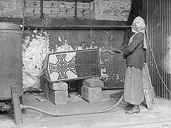 A design being applied to a gravestone by sandblasting, Aberdeen, Scotland, October 1918