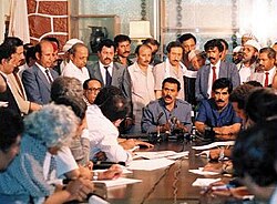 North Yemeni president, Ali Abdullah Saleh, with the Secretary-General of the Yemeni Socialist Party, Ali Salem al-Beidh, signing the unity agreement on 30 November 1989.