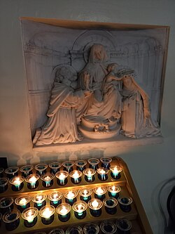 Marble relief of SS Dominic and Catherine