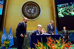 Signing by John Kerry in United Nations General Assembly Hall for the United States