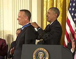 President Obama giving the Presidential Medal of Freedom to Hanks in 2016