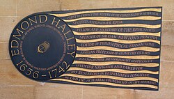 Comet-like plaque to Halley in the South Cloister of Westminster Abbey