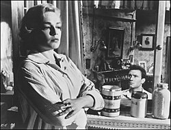 Simone Signoret with Laurence Harvey in Room at the Top; the film established her as an international actress.