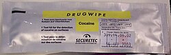 Drugwipe test can detect traces of illicit substances, including cocaine, on surfaces such as driver's licenses at random checkpoints.