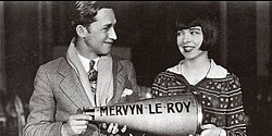 LeRoy on the set of Oh, Kay! (1928) alongside Colleen Moore