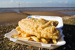 Fish and chips, a popular take-away food throughout the United Kingdom, has been described as the quintessential British dish.[224]