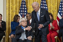 Donahue receiving the Presidential Medal of Freedom from President Joe Biden in May 2024