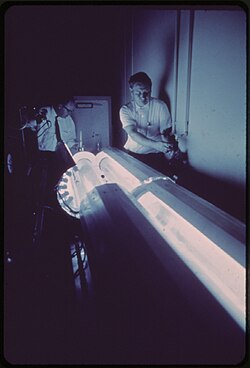 Researchers at the Statewide Air Pollution Research Center manufacture smog using a photochemical tube reactor (May 1972).