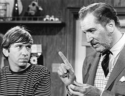 A health inspector (guest-star Vincent Price, right) tells Rufus (Bob Denver) to clean up the diner in the Season 2 episode "Fly in My Stew."
