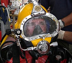 US Navy Diver using Kirby Morgan 37 diving helmet