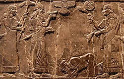 Jehu, the King of the Kingdom of Israel (Samaria) giving tribute to Shalmaneser III of Assyria; from the Black Obelisk of Shalmaneser III made in 827 BCE.