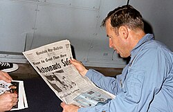 Astronaut Jim Lovell reading the Star-Bulletin's report of his crew's safe return after the Apollo 13 mission