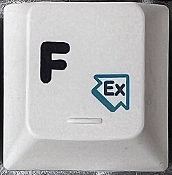 German E1 key with "Extra selector" as AltGr+f