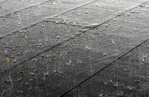 Heavy rainfall on a roof