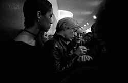 Warhol with his superstars Carol LaBrie and Jane Forth at the opening of his retrospective at the Pasadena Art Museum, 1970
