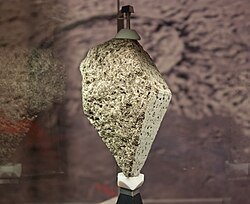 Lunar olivine basalt formed around 3.3 billion years ago. This is part of sample 15555, known as Great Scott.