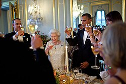 Hanks with Queen Elizabeth II and U.S. President Barack Obama at Winfield House in London