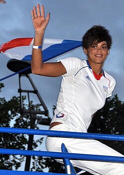 Coralie Balmy, freestyle swimmer, at the parade of French medallists of the 2012 Olympics (August 2012)