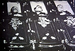 The coffins of Tom and Frank McLaury, with Billy Clanton's coffin on the right