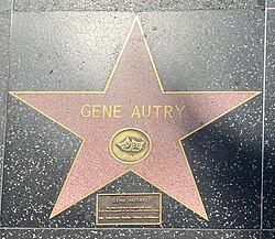 Autry's star for Live performance, noting that he has a star in five categories — Radio, Television, Motion Pictures, Recording Live Performance.