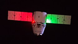 Red and green bottom navigation lights on SpaceX Dragon