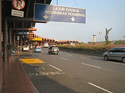Road signs in an airport terminal