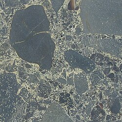 Basalt breccia in the Canary Islands; green groundmass is composed of epidote
