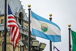 The former flag of Syracuse (1915–1974, 1994–2023) flies over Clinton Square