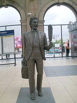 The statue of Dodd at Liverpool Lime Street railway station