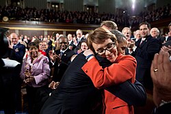 Giffords embracing President Obama at the 2012 State of the Union Address