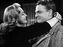 With Virginia Mayo in White Heat (1949)