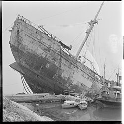 1952 photograph of Donau being salvaged. Her Maierform bow has been raised above the water, showing the part of its profile that would normally be below the waterline.