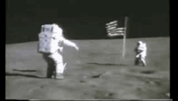 Astronaut John Young jumping on the Moon, illustrating that the gravitational pull of the Moon is approximately 1/6 of Earth's. The jumping height is limited by the EVA space suit's weight on the Moon of about 13.6 kg (30 lb) and by the suit's pressurization resisting the bending of the suit, as needed for jumping.[1][2]