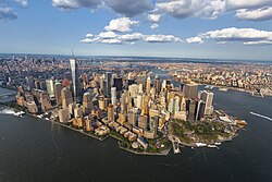 Lower Manhattan, including Wall Street, the world's principal financial center,[32] and One World Trade Center, the tallest skyscraper in the United States