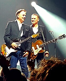 Adams with longtime guitarist Keith Scott in 2017