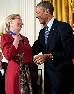 Streep receiving the Presidential Medal of Freedom from Barack Obama in 2014