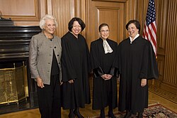 The first four women Supreme Court Justices: Sandra Day O'Connor, Sotomayor, Ruth Bader Ginsburg, and Elena Kagan. O'Connor is not wearing a robe because she is retired from the Court.