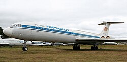 Unladen Il-62 resting on its extended tail strut