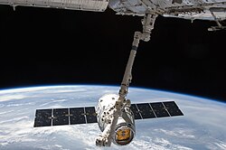 The second mission of the SpaceX Dragon capsule is berthed to the ISS.