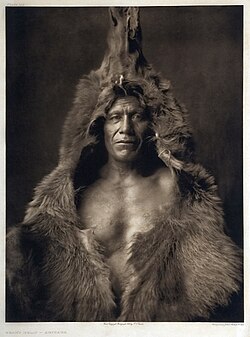 Arikara man wearing a bearskin, 1908