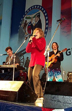 King performing aboard USS Harry S. Truman in the Mediterranean in 2000