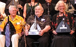 David Hartwell, Charles N. Brown, and Connie Willis pose with the 2008 Hugo Awards.