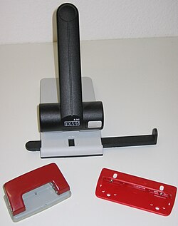 Three different international-standard two-hole punches