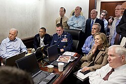 Photo of Obama, Biden, and national security staffers in the Situation Room, somberly listening to updates on the bin Laden raid